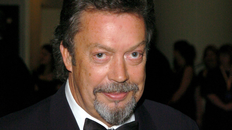 Tim Curry speaking while on stage