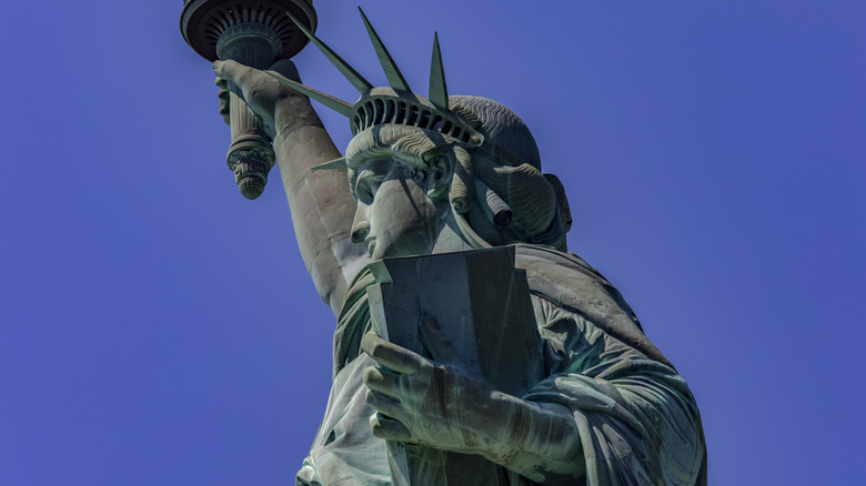 Statue of Liberty profile blue sky