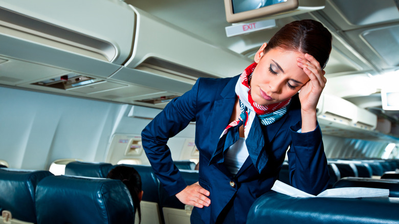annoyed flight attendant