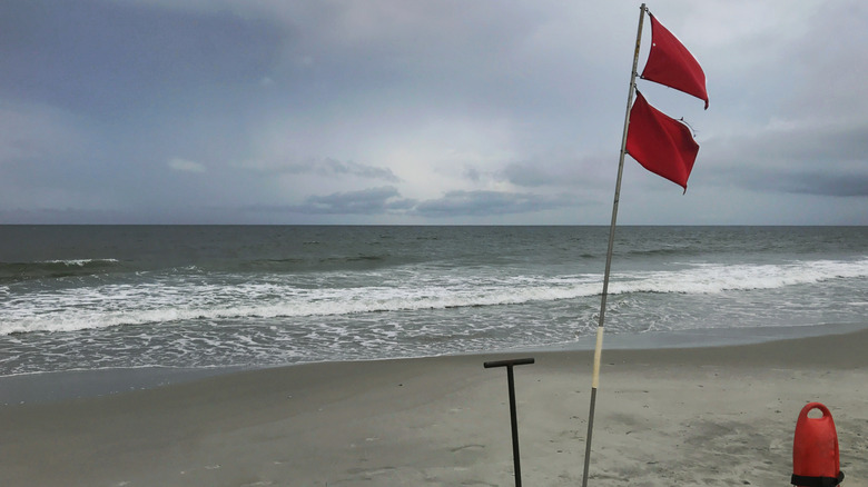 a double red beach flag